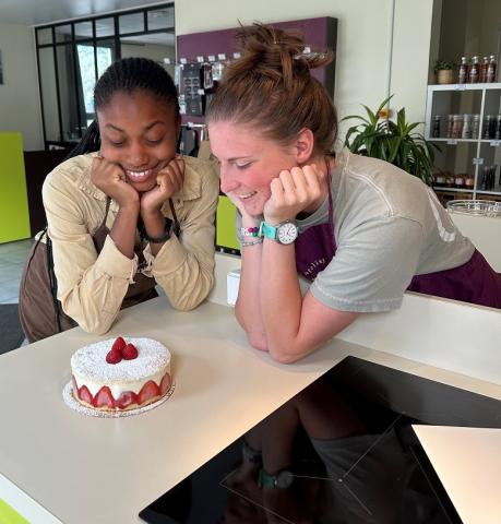 Fifth-year Chemical Engineering major Dara Jakande and third-year Chemistry major Sammy Rizzo admire their “fraisier," a French sponge cake made with strawberries. Fifth-year Chemical Engineering major Dara Jakande and third-year Chemistry major Sammy Rizzo admire their “fraisier," a French sponge cake made with strawberries.