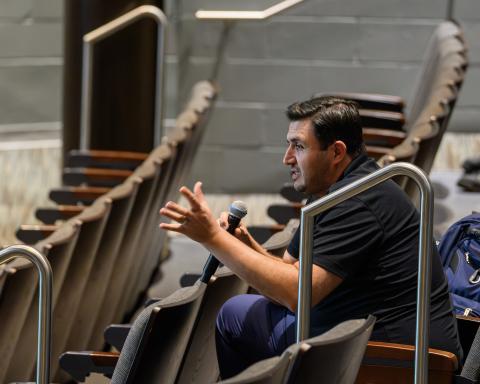 Presenters and attendees engaged in Q&A